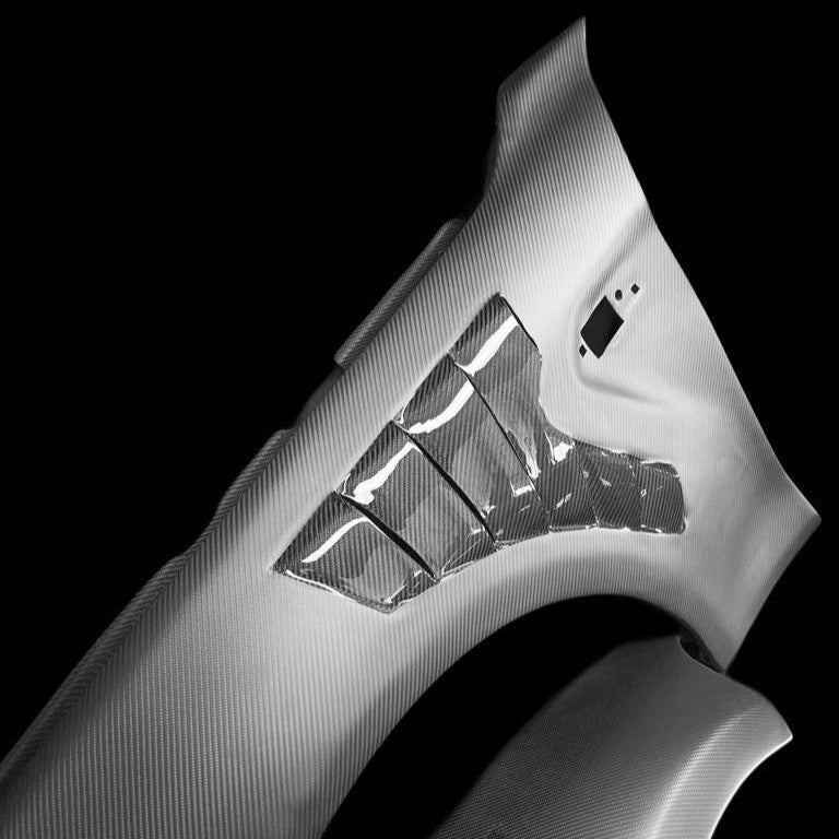 Carbon fiber fenders for BMW, Audi, Volkswagen, Toyota, and MINI, including wide fenders, vented fenders, and OEM-style fenders. Designed for improved aerodynamics, weight reduction, and an aggressive racing look.