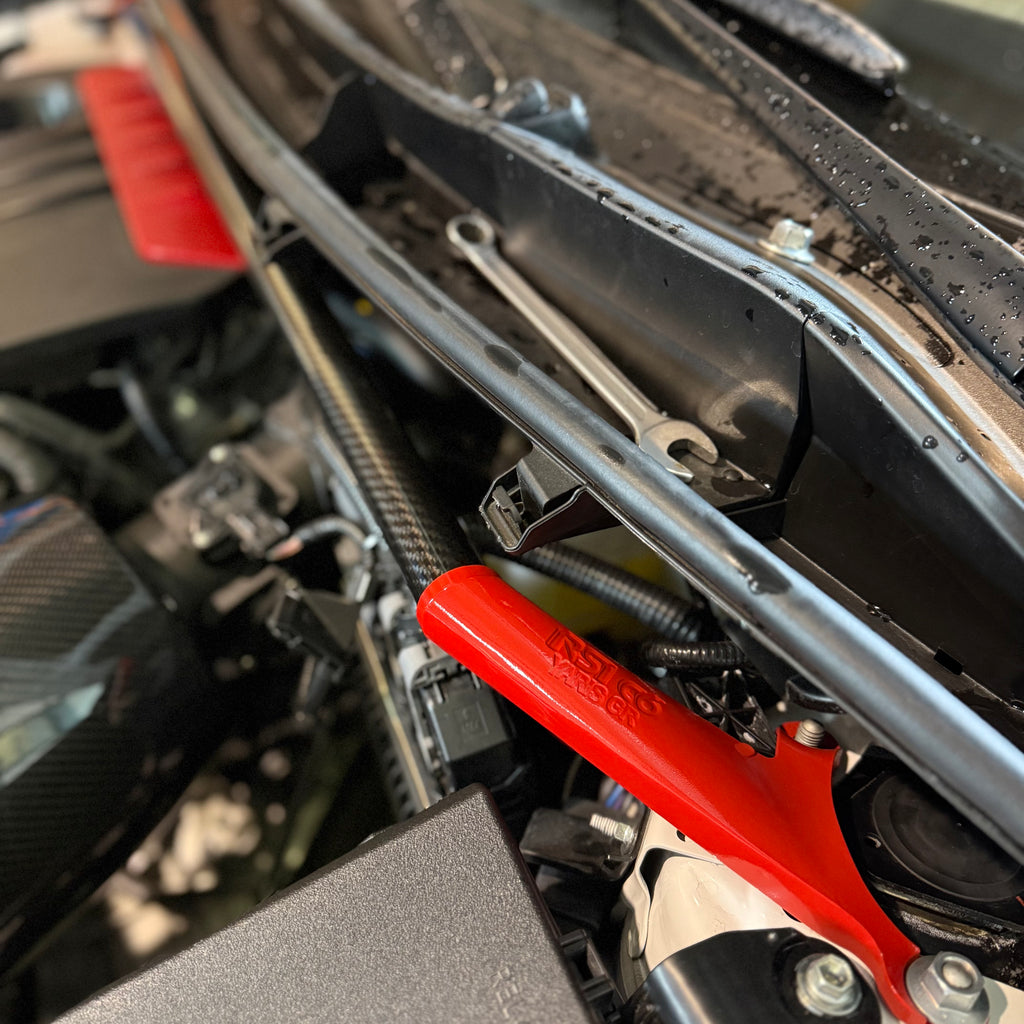 Front Strut Bar in Gloss Carbon Fiber and red alluminium for Toyota GR Yaris mk2 by RSI c6
