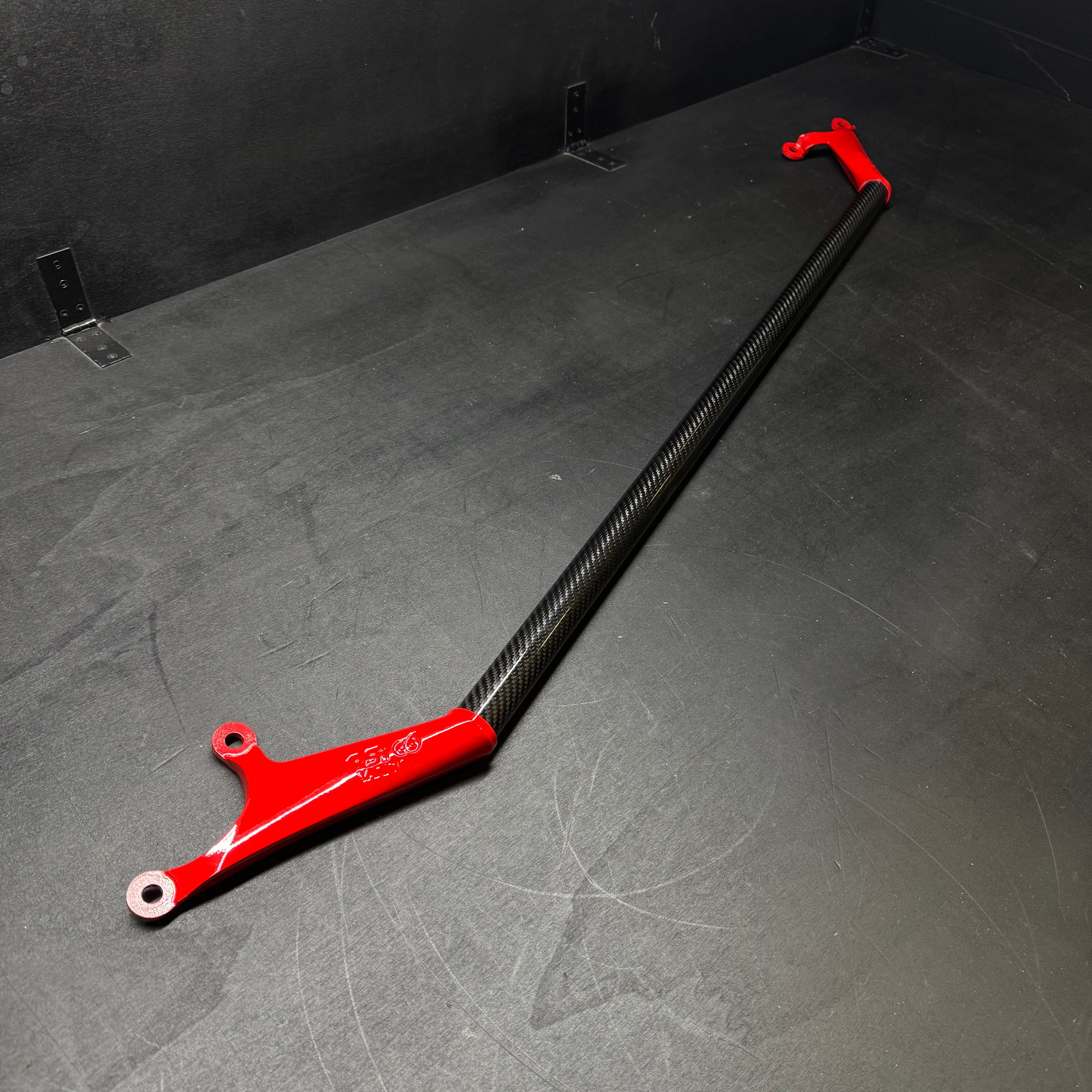 Front Strut Bar in Gloss Carbon Fiber and red alluminium for Toyota GR Yaris mk2 by RSI c6