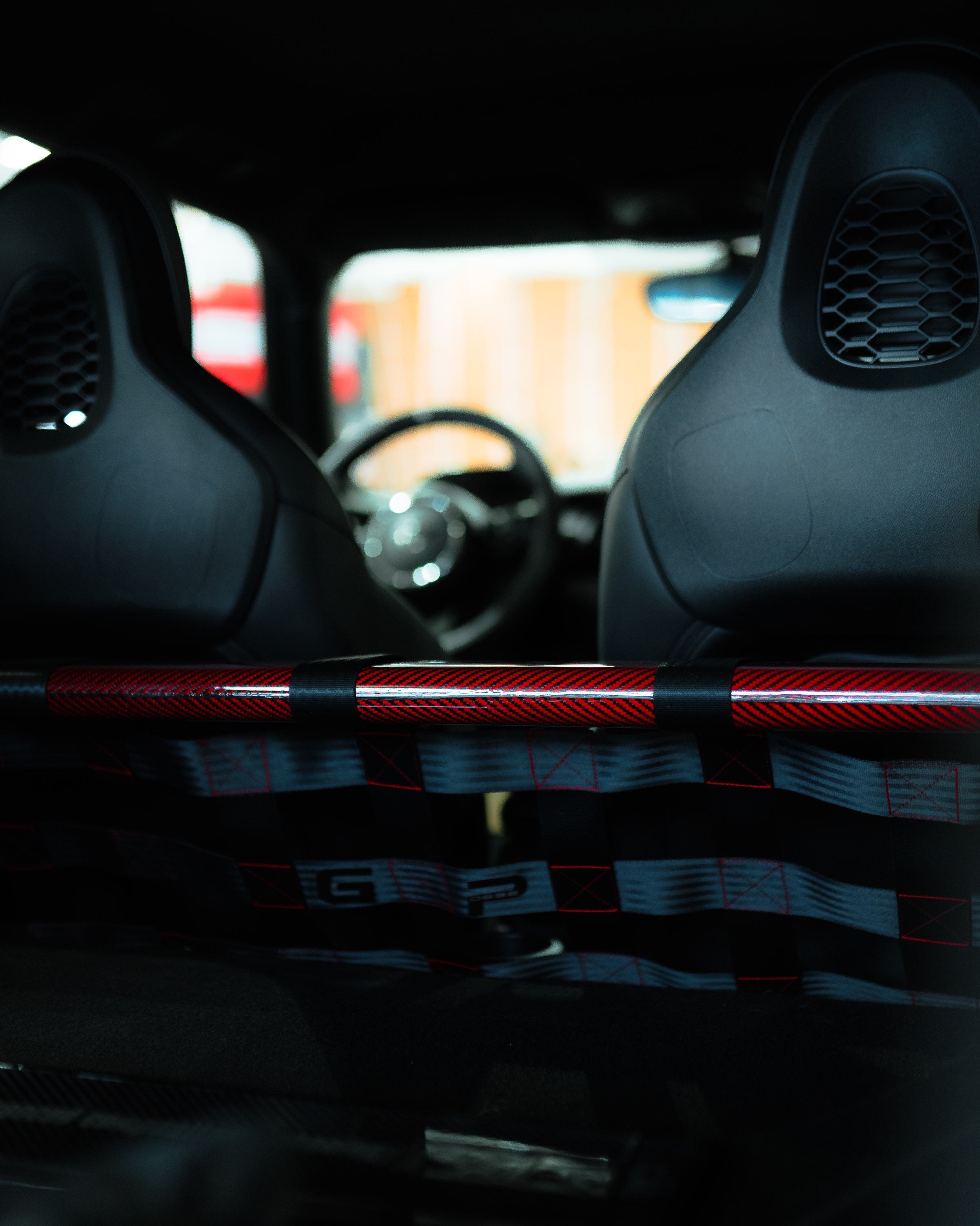 Rear strut bar in carbon fiber or forged carbon for MINI GP3. It replace the original 