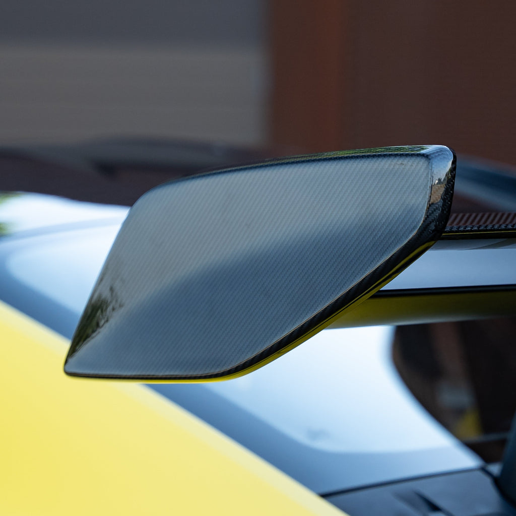 Rear Wing Tips in Carbon Fiber for PORSCHE 911 GT3 RS (992) by RSI c6