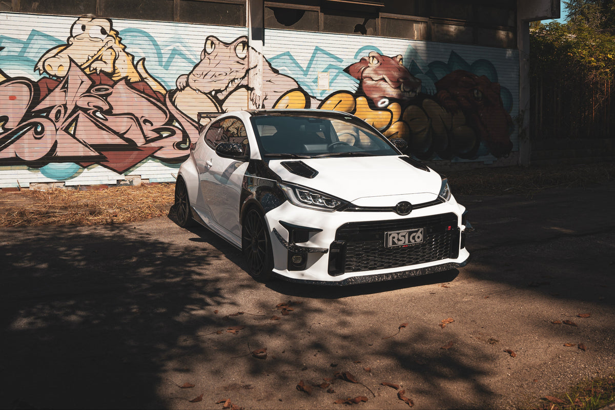 Toyota GR Yaris MK1 in full forged carbon fiber body kit by RSI c6 – side/front view
