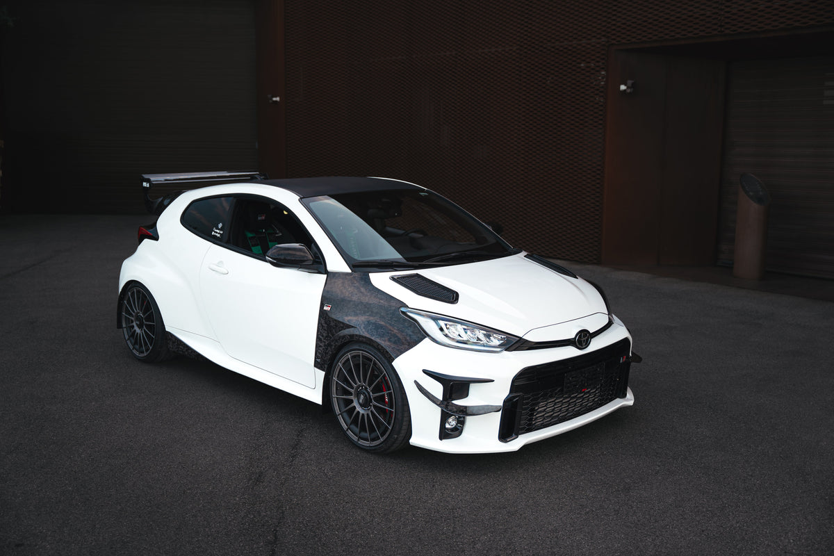 Toyota GR Yaris MK2 in full forged carbon fiber body kit by RSI c6 – side/front view