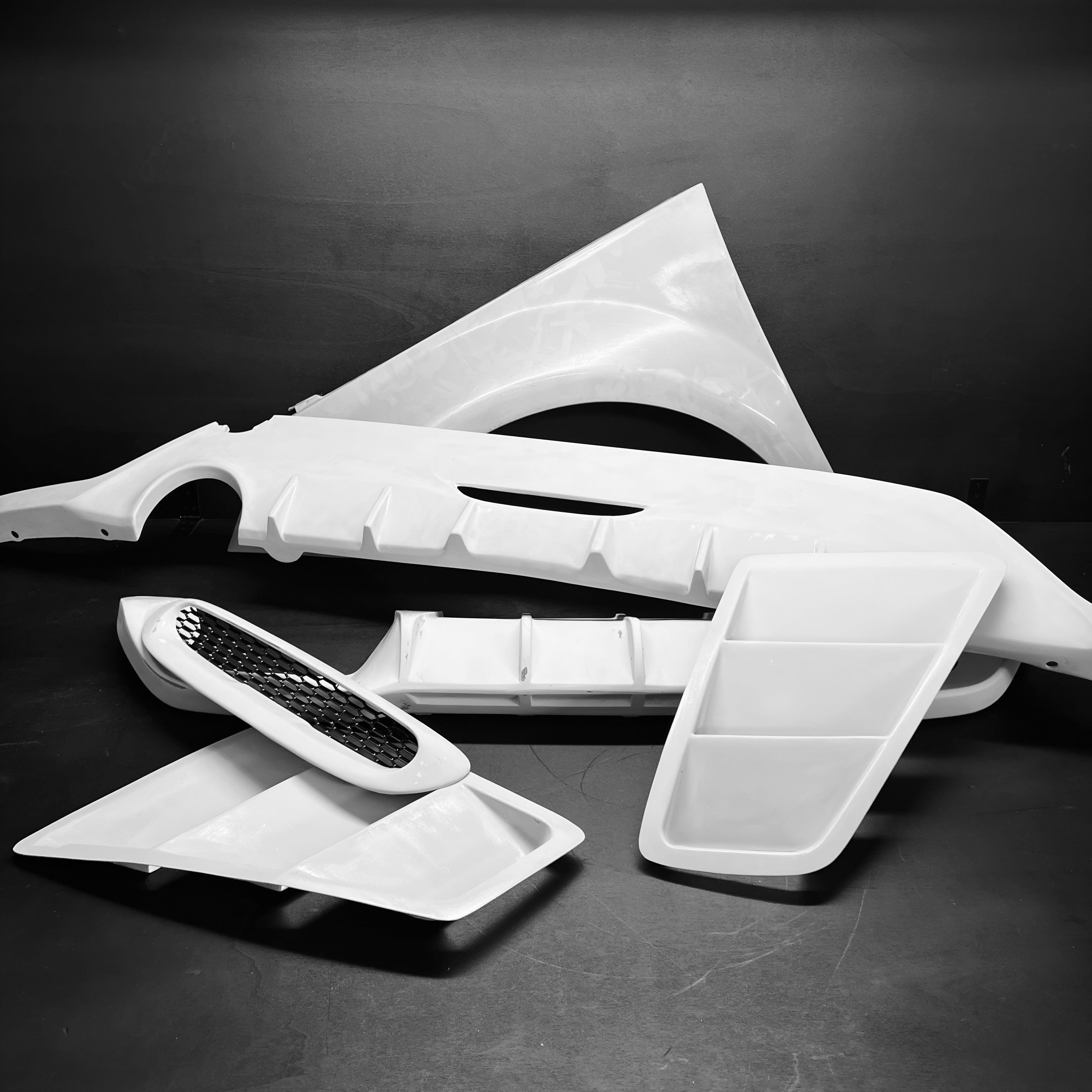 Raw unpainted carbon fiber parts handcrafted in Italy by RSI c6